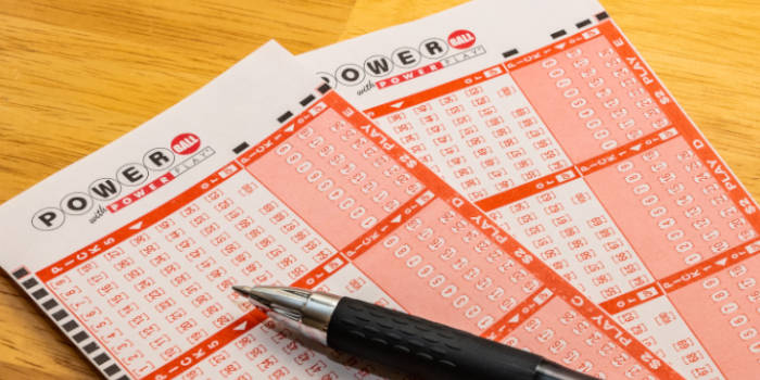 A couple of Powerball tickets and a pen