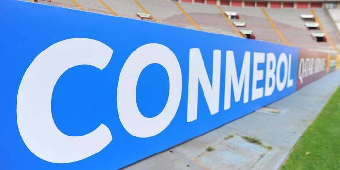 CONMEBOL's logo at a stadium
