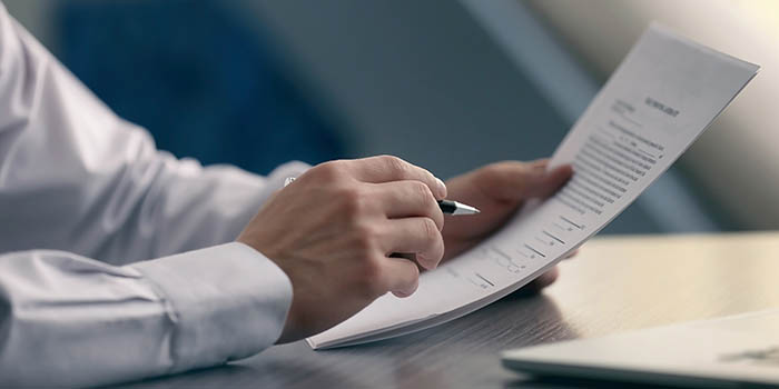 Businessman reads a document